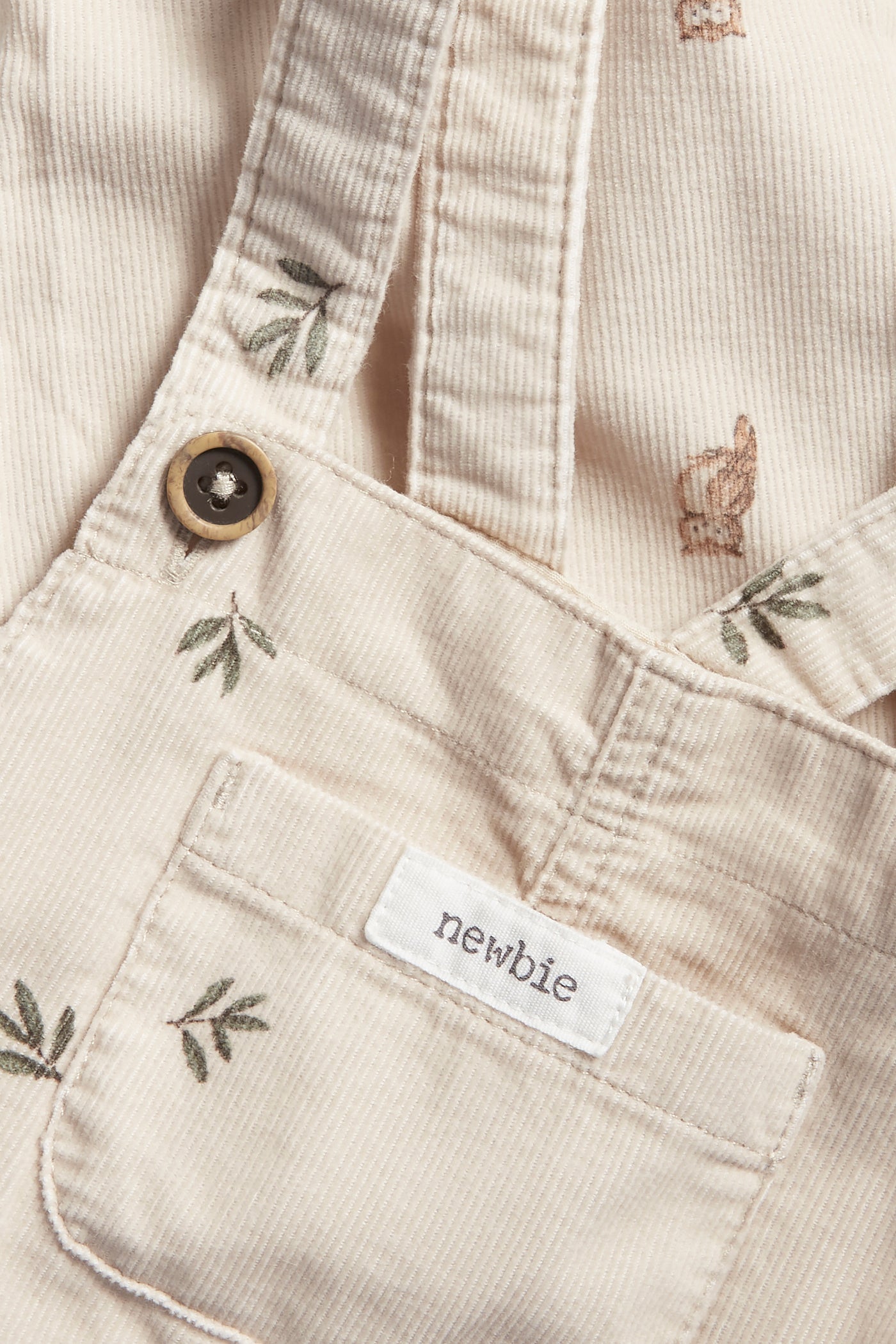 Baby beige owl patterned corduroy overalls